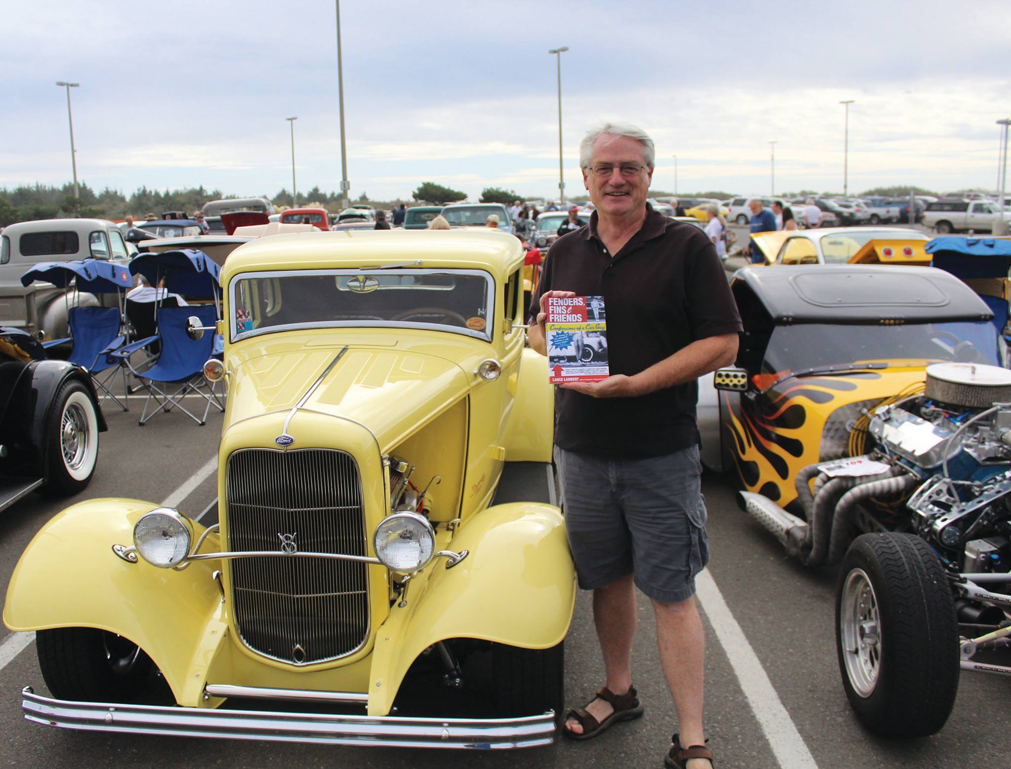 North Coast News: Lance Lambert displays one of his books at the Quinault Beach Resort and Casino during Show n’ Shine at the Shores.