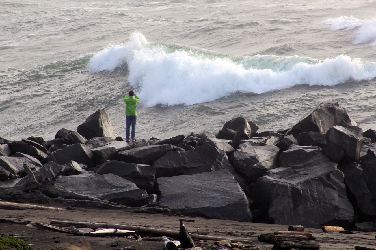 Angelo Bruscas/North Coast News: High seas brought out a small crowd to witness the power of the recent storm at the North Jetty in Ocean Shores on Friday afternoon.