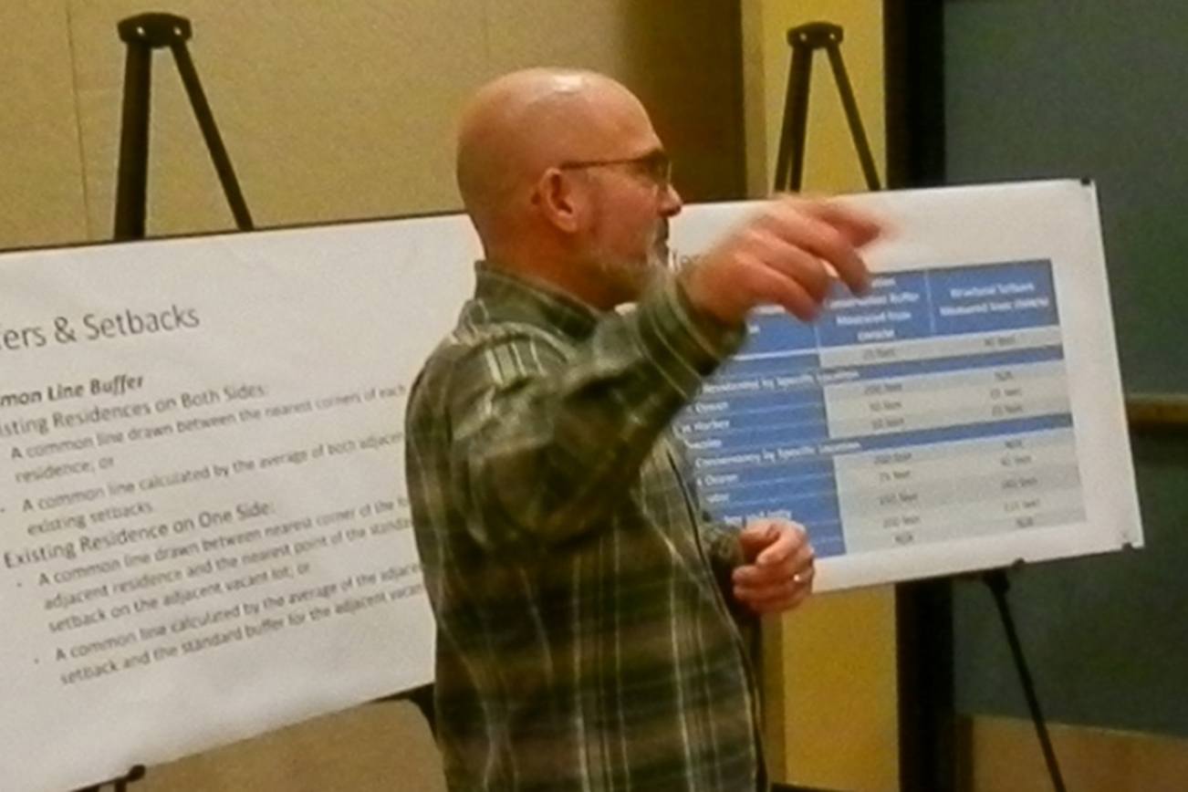 North Coast News: Planning Commission Member Eric Noble shows some of the changes that could occur under the new Shoreline Management Plan for Ocean Shores.