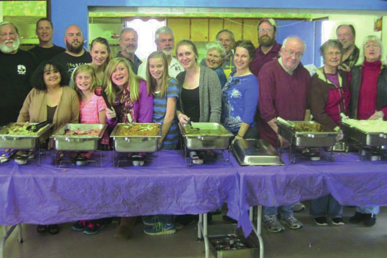 North Coast News file photo of volunteers helping prepare the Lions Club/Ocean Shores Community Thanksgiving Dinner.