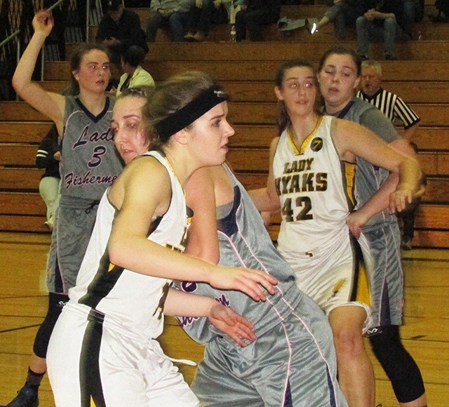 Scott D. Johnston photo: Lady Hyaks seniors Riley Moore (foreground) and Helen Garman (42) in action against Ilwaco.