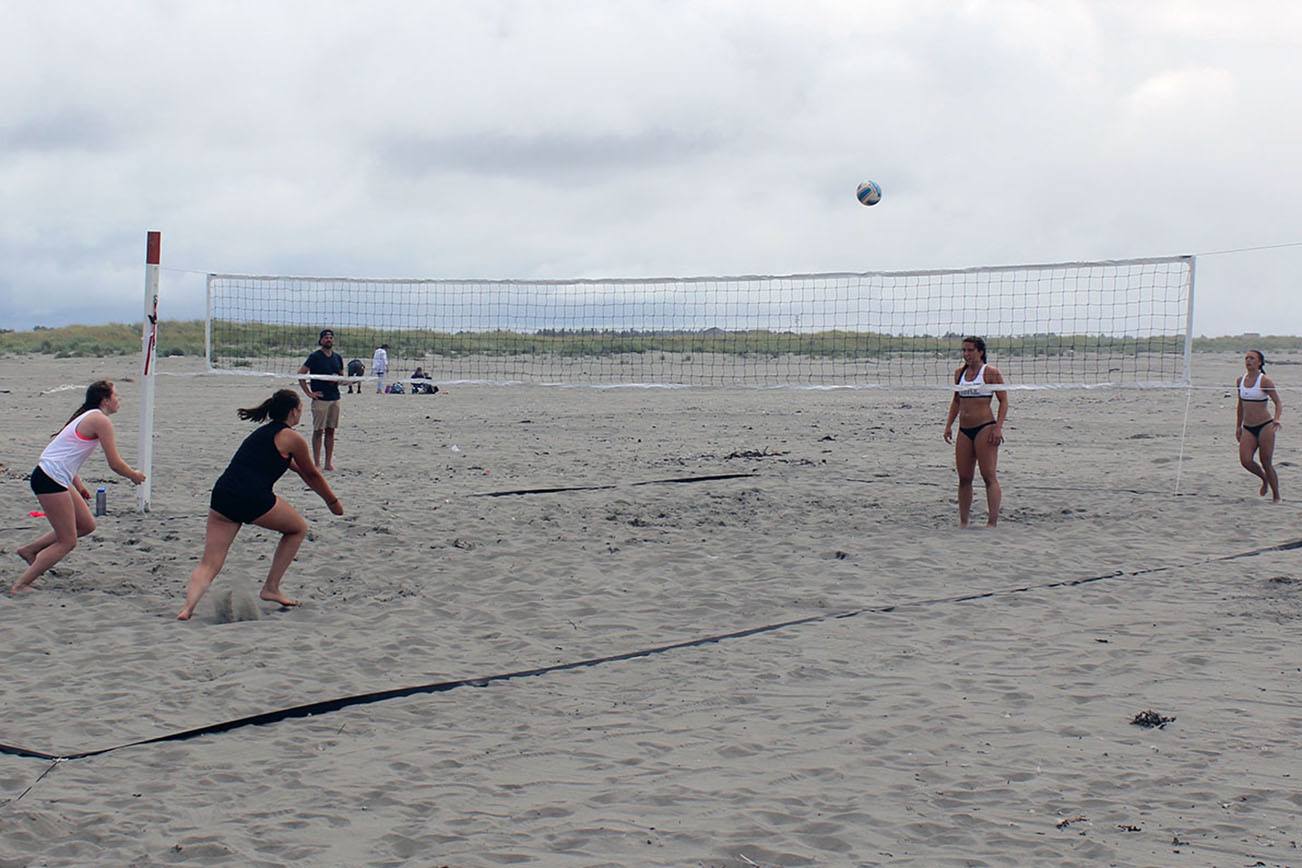 North Coast News: Volleyball players compete during the 2016 Beach Blast on the beach at Ocean Shores.