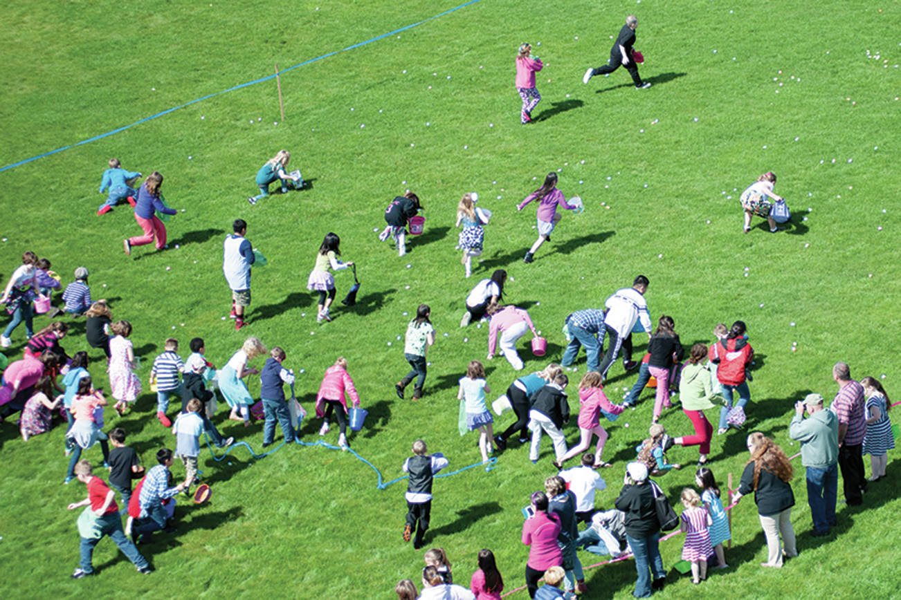 Ocean Shores Fire Department photo: Kids scramble across the field at Ocean Shores Elementary School for the annual Easter Egg hunt sponsored by the Ocean Shores Firefighters Association.