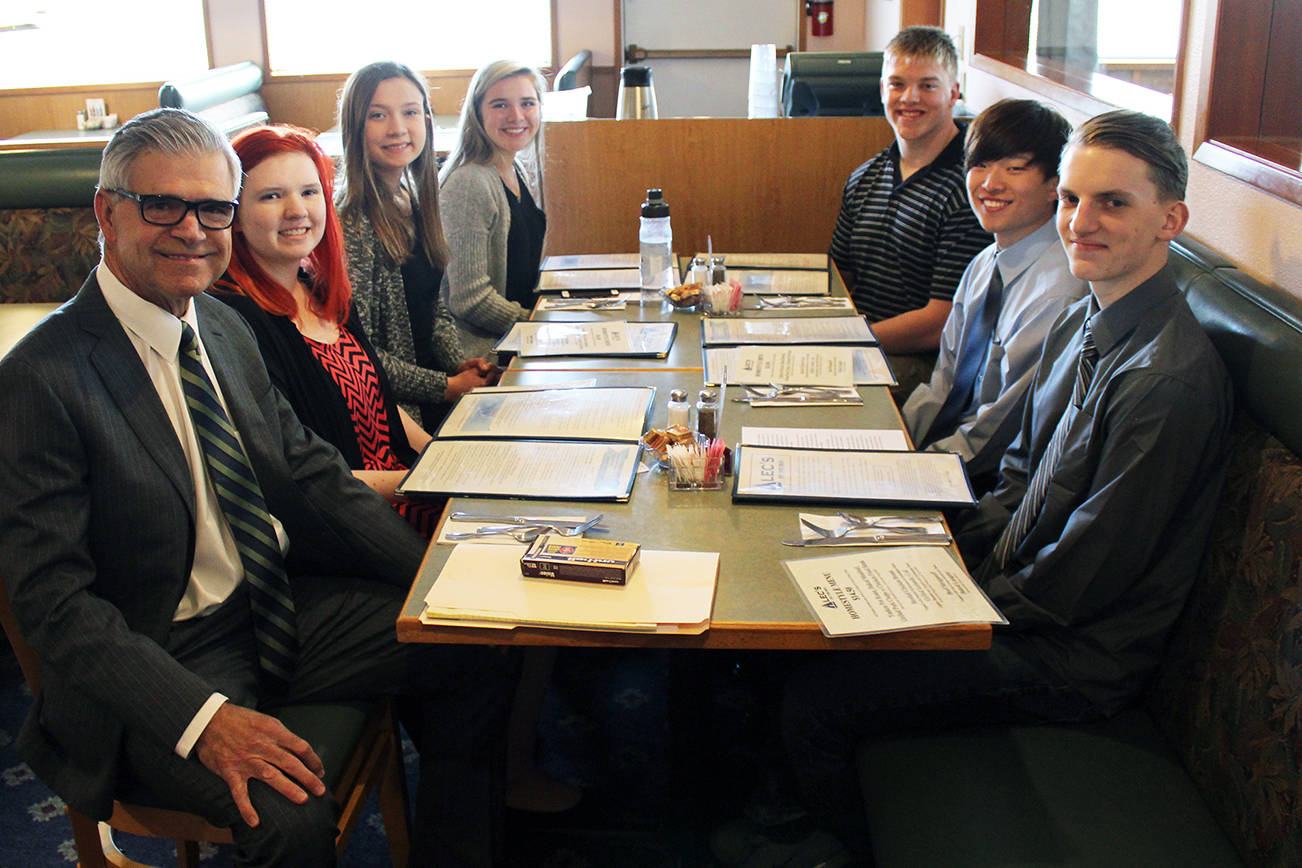Angelo Bruscas/North Coast News: The students competing for the 2017 Oean Kiwanis Scholarship program are from right: Ryan Turner, Christopher You, Seth Bridge, Reilly Moore, Olivia Harnagy and Emly Deal, with Scholarship Chairman and School Board member Scott Sage. The scholarships will be awarded at the Kiwanis May 17 banquet and auction at the Ocean Shores Convention Center. See Page 2 for more information.