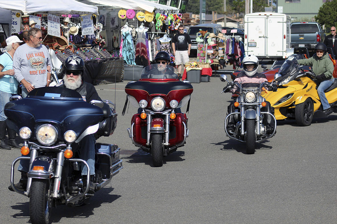 Angelo Bruscas/North Coast News: A group of riders sets out from the Ocean Shores Convention Center at the 2016 Bikers on the Beach event.