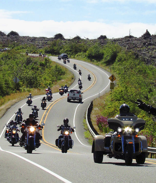 Scott D. Johnston photo of the bikers on parade down the hill from Hoquiam, headed to the beach on State Route 109.