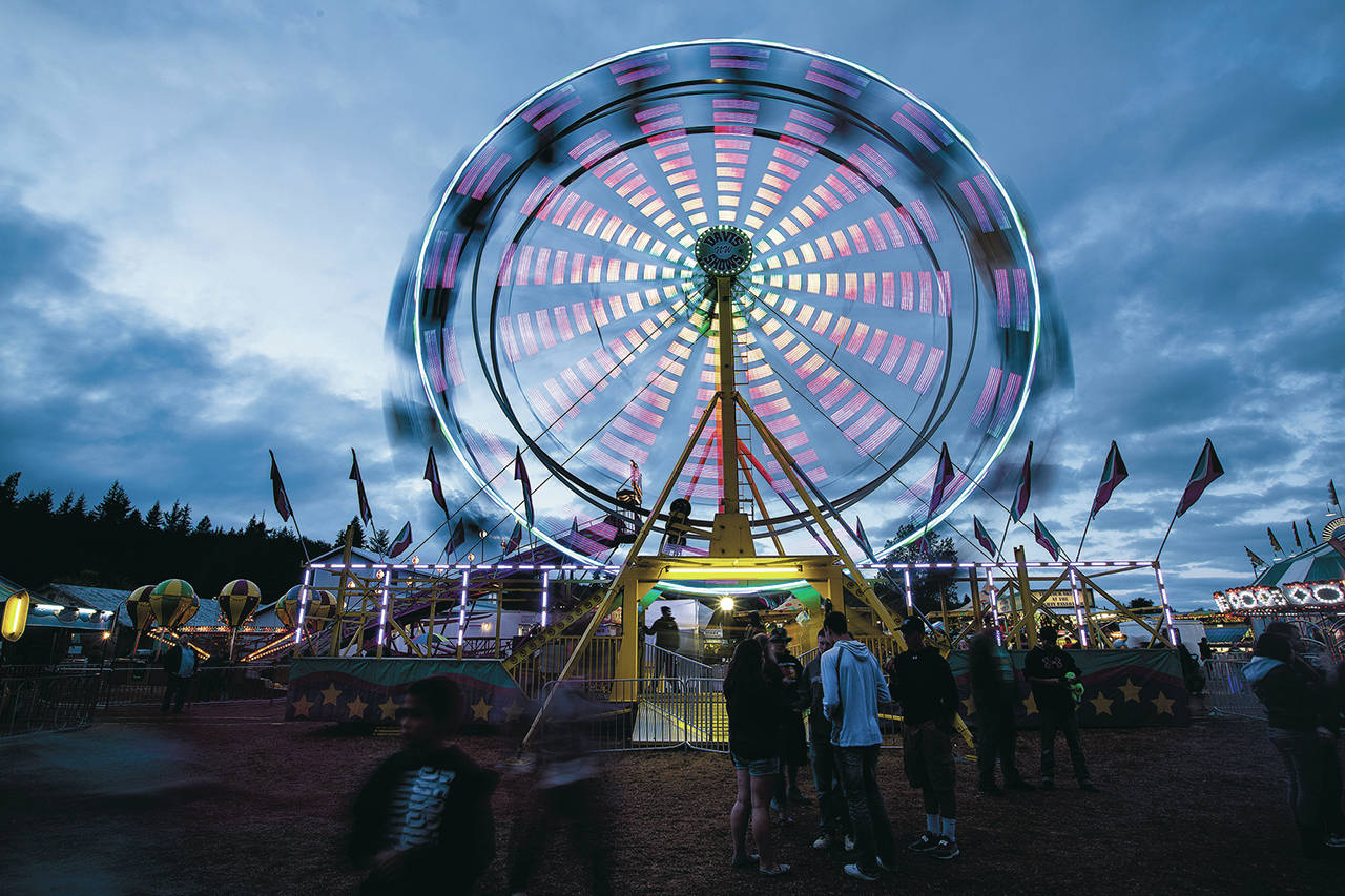 Gabe Green | The Daily World                                The ferris wheel spins at the 2016 Grays Harbor County Fair. This year’s event will run Aug. 9-13.