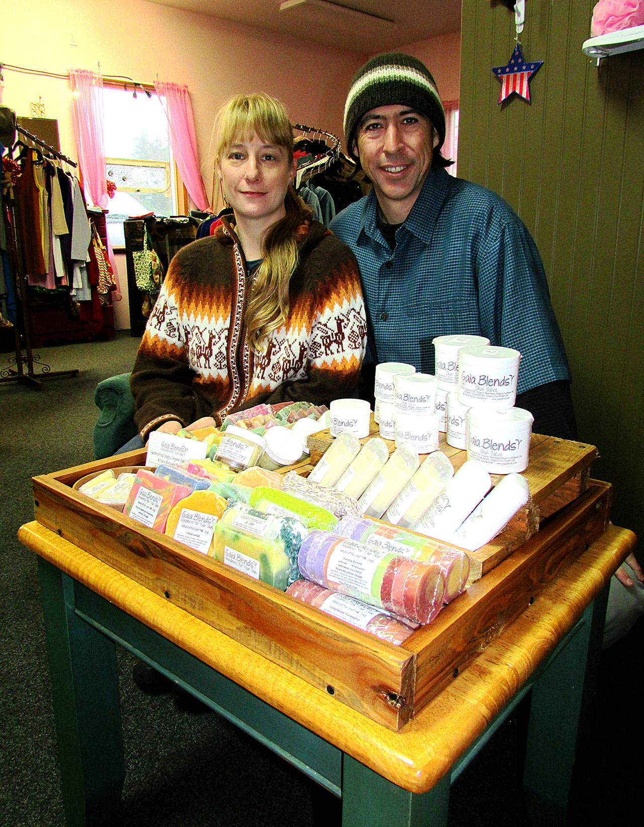 Scott D. Johnston photo: Laura and Ben Brannon make their Gaia Blend organic salves, soaps and other products at their home in Ocean Shores.