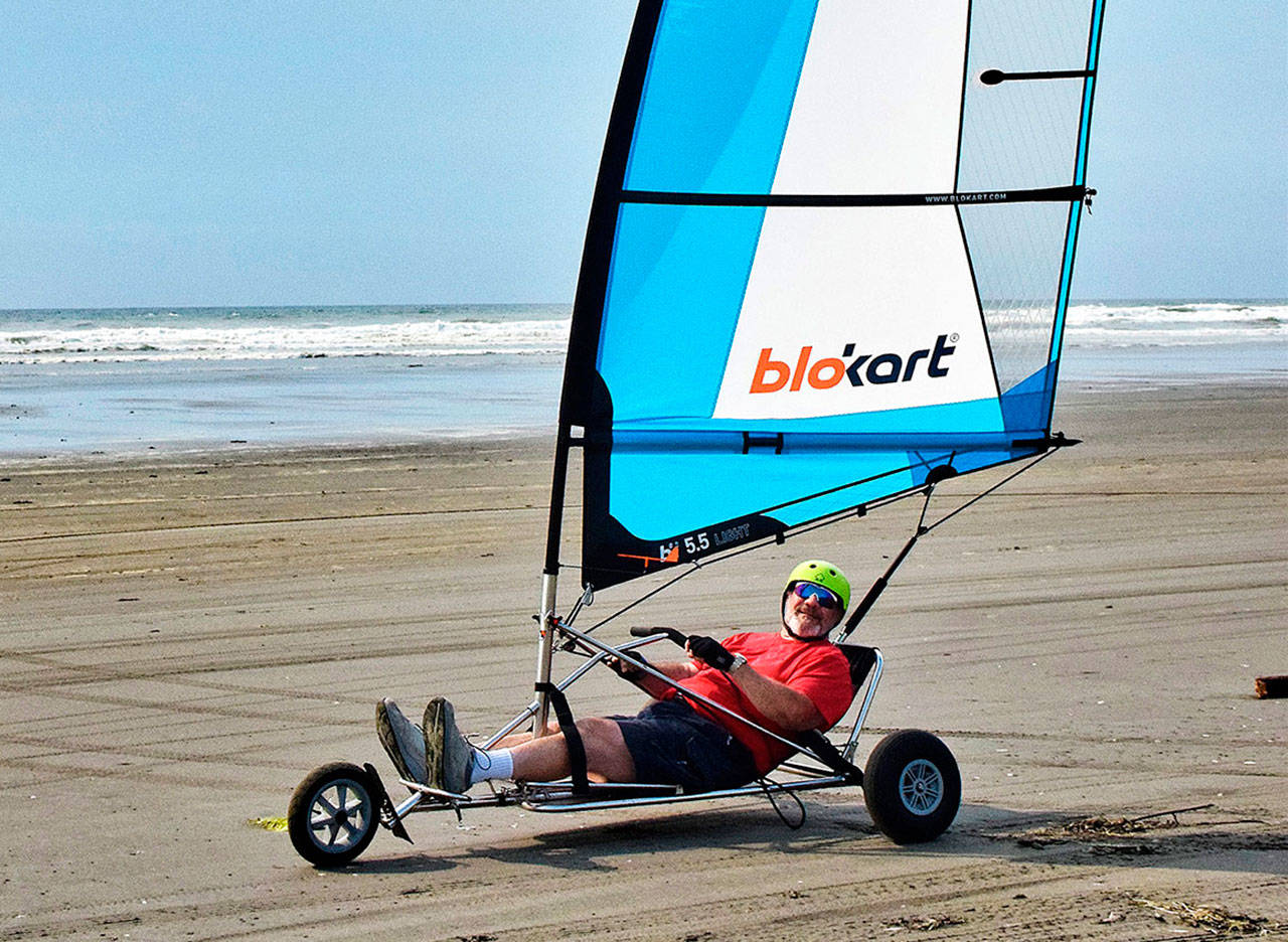 Sand & Sails H2O owner Paul DiGangi demonstrates one of the BloKarts he has available for rental and purchase. Photo by Scott D. Johnston