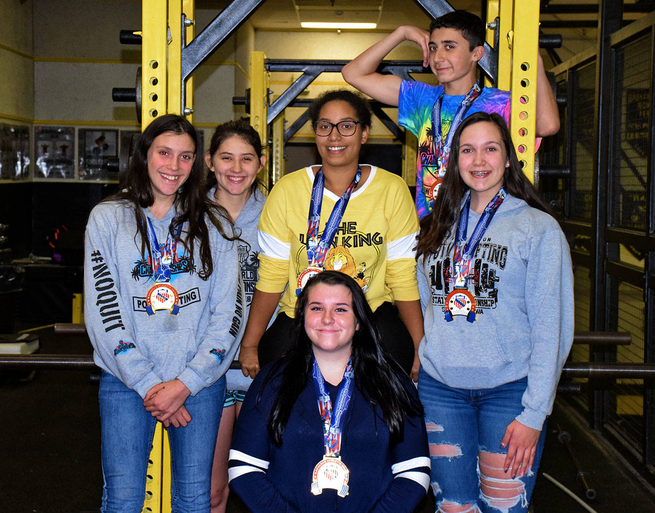 North Beach powerlifters bring home World gold medals