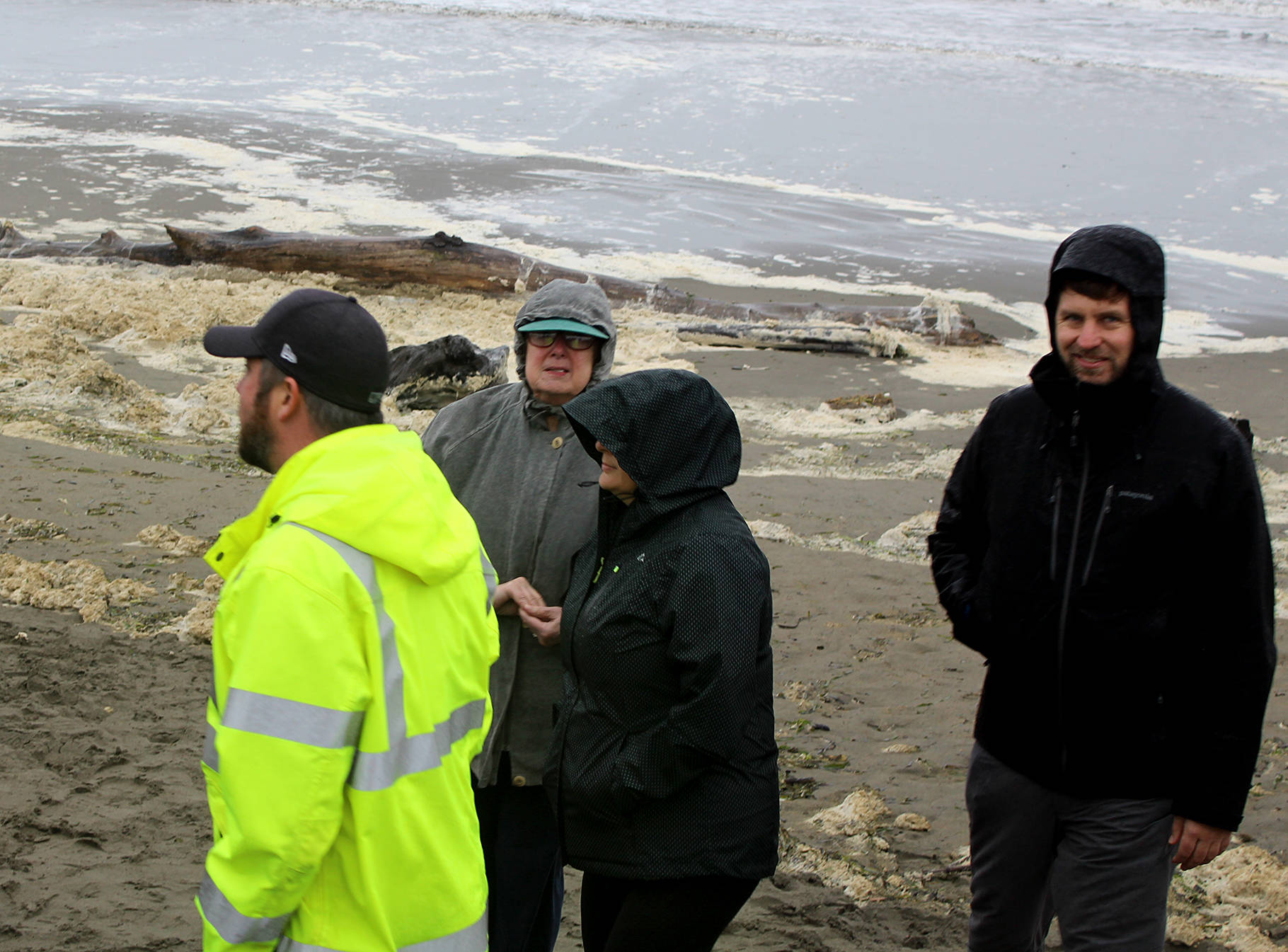 Angelo Bruscas/North Coast News Ocean Shores Public Works Director Nick Bird, left, and Mayor Crystal Dingler, center, give a tour of the areas of the city hit hard by coastal erosion, such as Damon Point, as part of the Coastal Marine Resources Committee Summit, including Surfrider’s Casey Dennehy, far right, last Thursday.