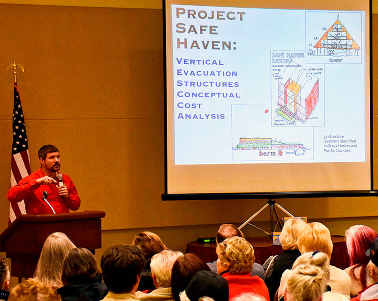 Earthquake Program Manager Maximilian Dixon with the Washington Emergency Management Division address a North Beach area crowd at the Ocean Shores Convention Center.