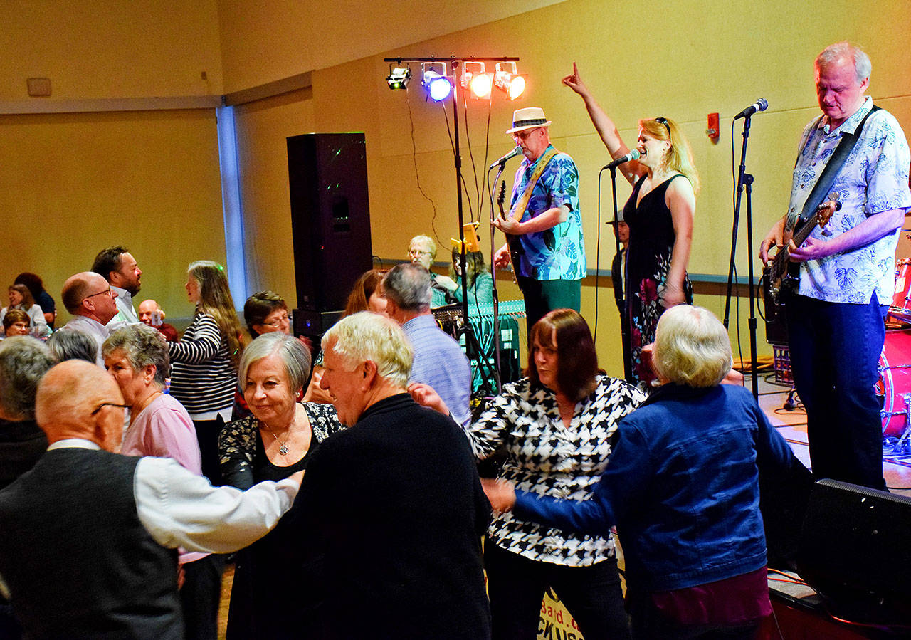 Scott D. Johnston photo of the band Raucous, playing last year at the annual benefit for the Ocean Shores Food Bank.