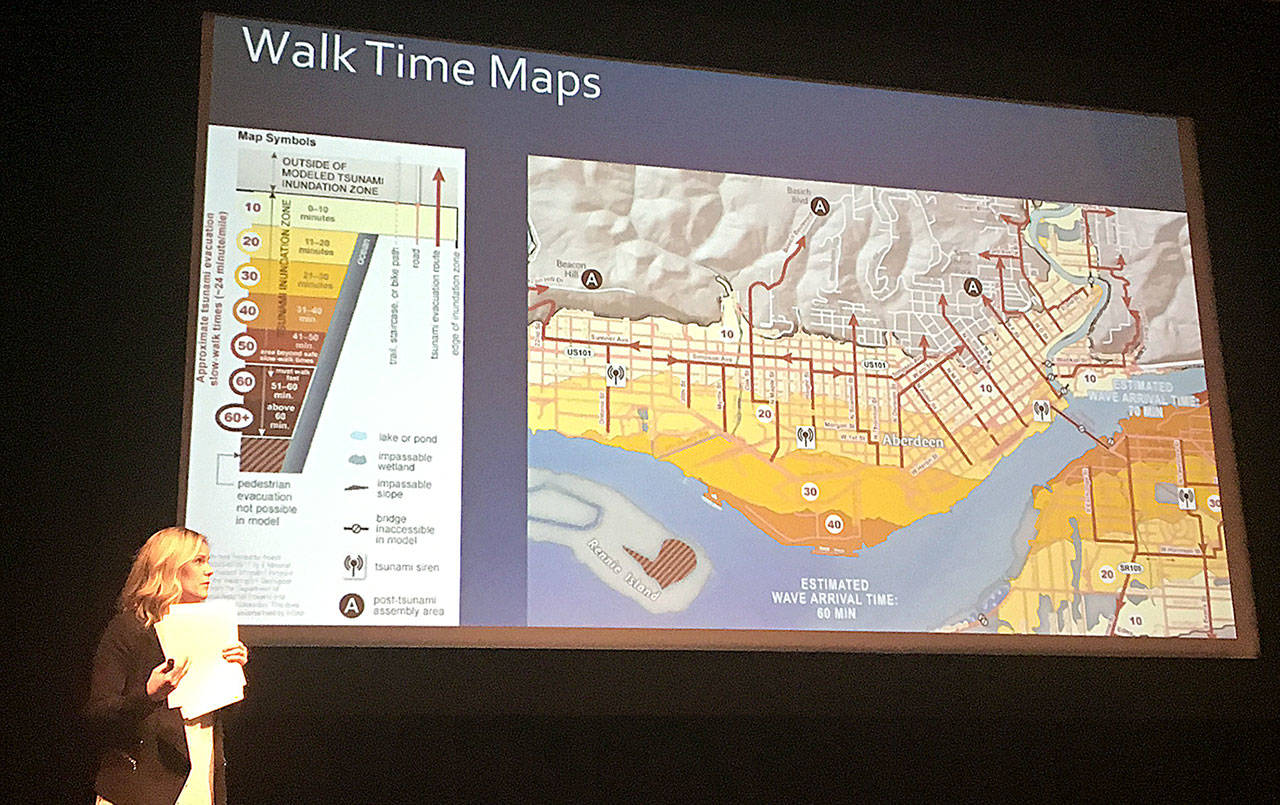 DAN HAMMOCK | GRAYS HARBOR NEWS GROUP                                A pedestrian tsunami evacuation map for Aberdeen, updated in early April, shows how long it would take to reach high ground on foot. Hannah Cleverly, Grays Harbor County Deputy Director of Emergency Management, explains it at the Tsunami Road Show Wednesday.