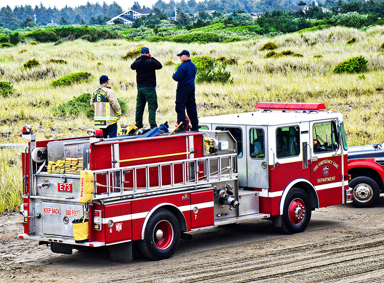 To get early detection of fires in the dunes, OSFD fire engines are positioned at beach approaches where they can serve as fire watch platforms. (North Coast News file photo)