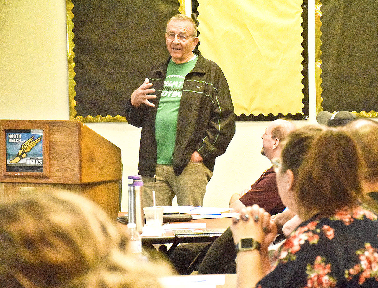 Sid Otton, left, the winningest football coach at any level in Washington State history, spoke to about 40 coaches, assistants and others at the North Beach Coaches Summit, held Friday at North Beach Junior/Senior High School.