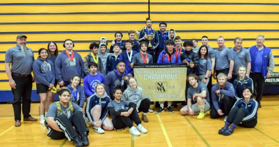 The Grays Harbor College wrestling team poses for a photo at the conclusion of the NCWA Northwest Conference Championships on Saturday at Aberdeen High School. Ryan Sparks I The Daily World