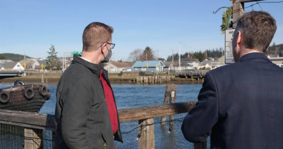 Rep. Kilmer (D-WA06) toured downtown Hoquiam with City Administrator Brian Shay and Mayor Ben Winkleman on Friday, Feb. 25, 2022. A stop along Levee Street provided a view of the proposed area for the North Shore Levee–West Segment along the Hoquiam River. Erika Gebhardt I The Daily World