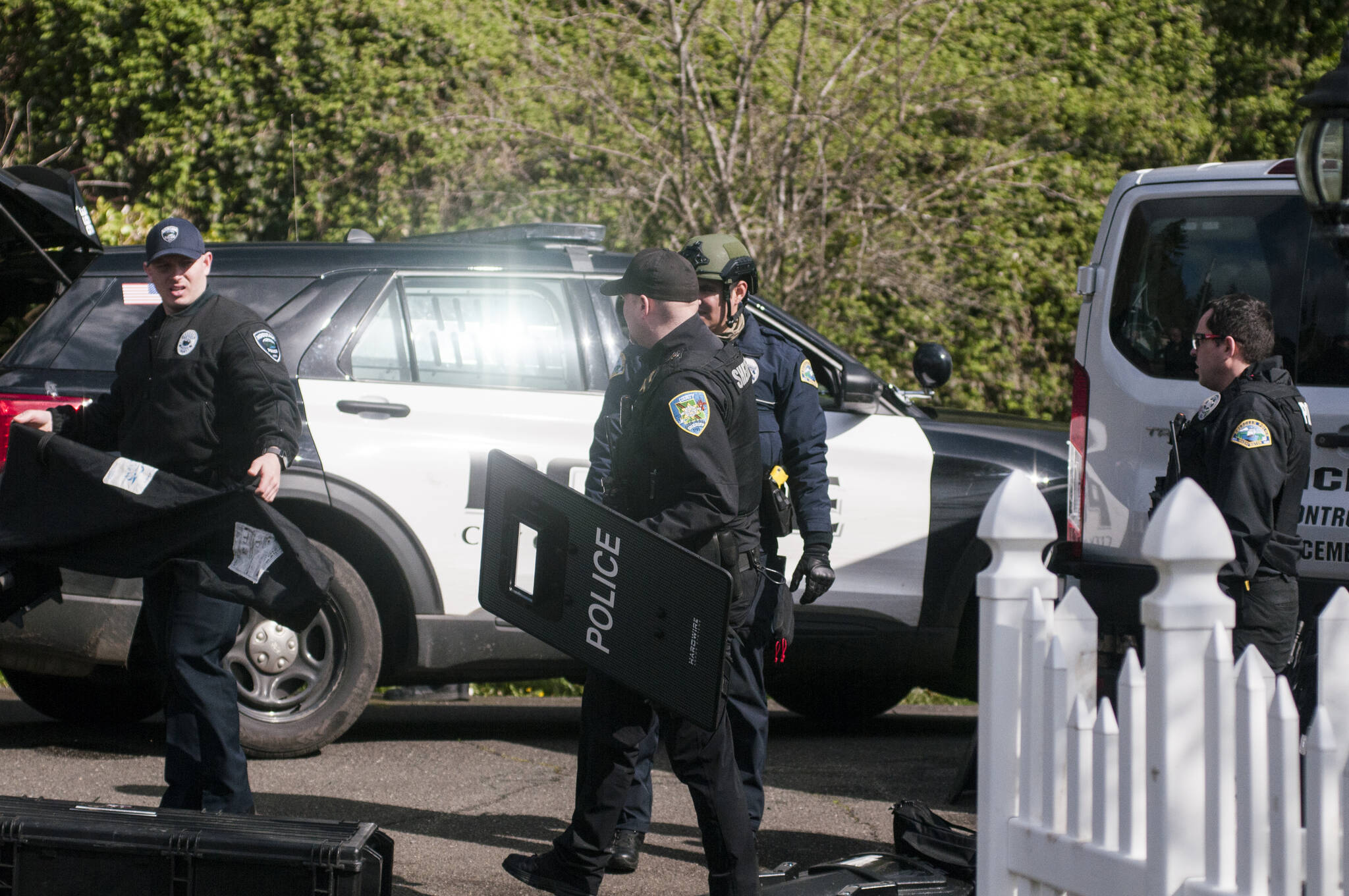 After the 19-hour standoff between Hoquiam Police officers and an armed 15-year old suspect wanted on a felony warrant, officers were seen preparing to leave the scene. Matthew N. Wells | The Daily World