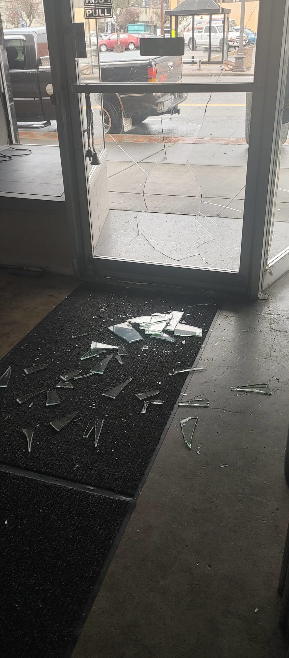 David Gleaves, owner of Deen Dogs, had to call his landlord to get his glass door fixed after a vandal “punched” the front door to his business on Wednesday evening, April 20, 2022. Gleaves said it took about a week to replace the glass, largely because of the frame and the type of glass used. Provided photo