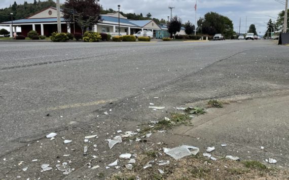 (Michael S. Lockett / The Daily World)
                                Debris from a motor vehicle crash decorates the corner of Sumner Avenue and Myrtle Street following a two-car crash on Tuesday, Sept. 20, 2022.