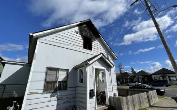 Damage is visible following a house fire on Thursday morning near the main Aberdeen fire station. (Michael S. Lockett | The Daily World)